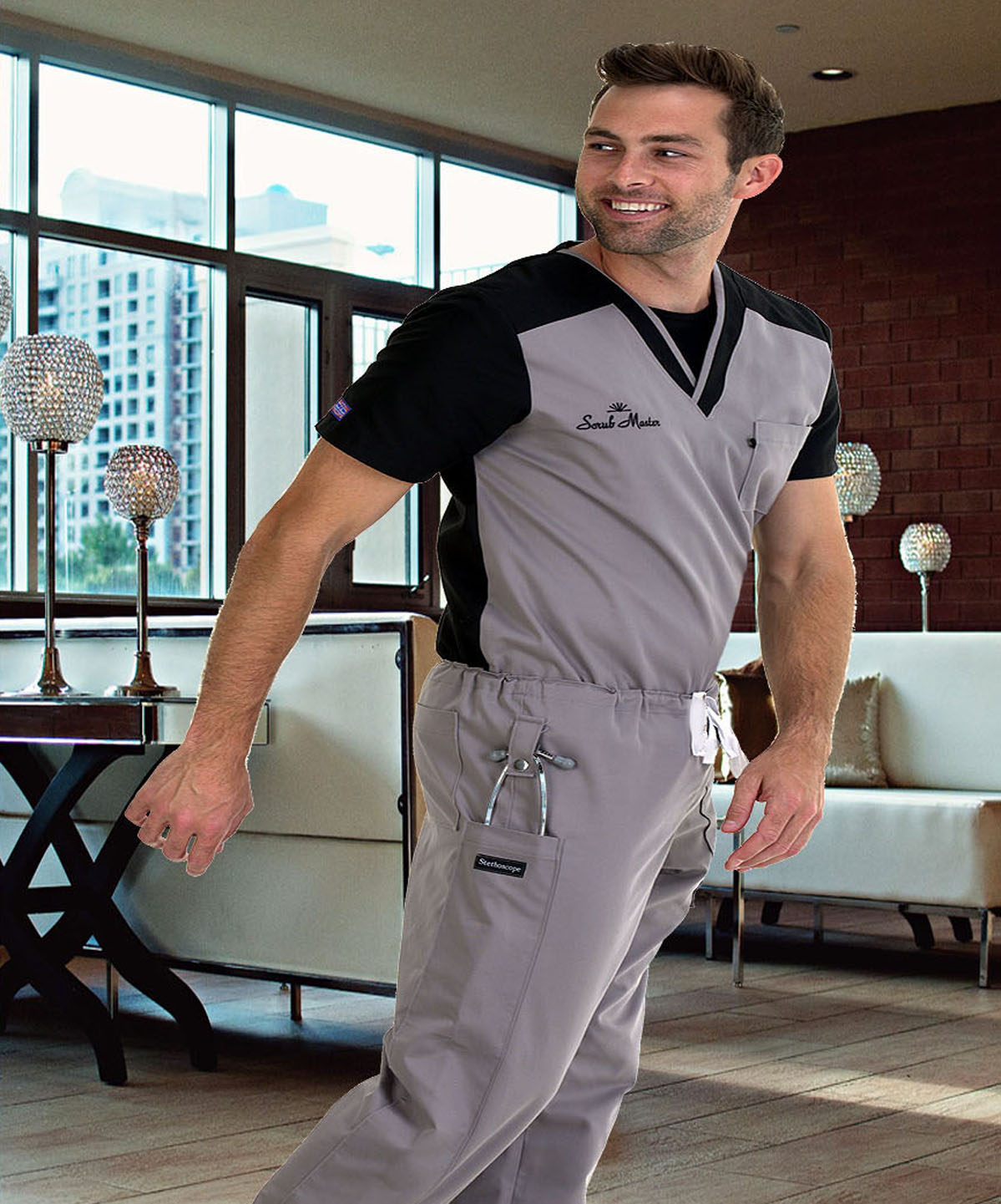 This is a picture of one of our male models wearing scrub master utility patent design scrub wear. Our scrubs are scientifically proven to stop hospital acquired infections and save lives. These scrub uniforms and jackets are the most advanced hospital and clinic medical uniforms on the market today. Shop scrub master and save big money.